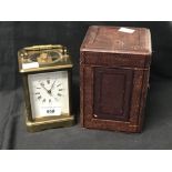 Clocks: 19th cent. Brass carriage clock in red Morocco carrying box. 5ins.
