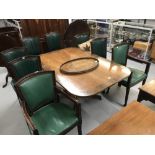 Georgian mahogany dining chairs with green leather upholstery plus a pair of later bespoke carvers