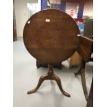 19th cent. Mahogany tripod tilt top table. Diameter 25½ins.