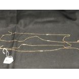 Hallmarked Gold: Long guard chain. Yellow metal of trace work and fancy link. Length 6½ins. Weight