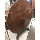 Early 19th cent. Mahogany tilt top dining table on single pedestal. 52ins.