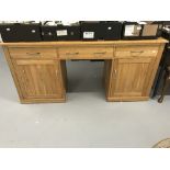 20th. cent. Beech effect double pedestal desk. 67ins. x 21ins.