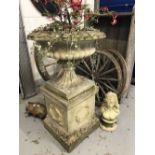 Gardenalia: Decorative garden planter on a large base bearing a laurel wreath to each corner. 39ins.