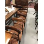 Early 19th cent. Mahogany sabre leg bar back upholstered dining chairs (8).