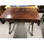 19th cent. Mahogany sofa table. Two drawers, splayed supports, end drop flaps. 37ins. 30½ins. x 21½