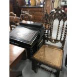 20th cent. Ebonised pine davenport with four drawers, turned supports 21ins. x 21ins. x 32ins.