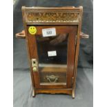 Smoking Requisites: 20th cent. Oak pipe rack with glazed door and single drawer. 12ins.