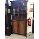 19th cent. Mahogany glazed two door bookcase/cupboard. 41ins. x 86ins.