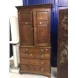 18th cent. Vernacular oak tallboy. Comprising of a cupboard over a chest of two short and three long