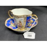 Helena Wolfson: two handled quatrefoil shape decorated cup and saucer, blue floral panels, alternate