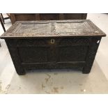 18th cent. Oak coffer with heavily carved decoration throughout. 37ins. x 18ins.