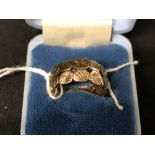 Hallmarked Gold: 9ct. Ring, 8mm fancy band, hallmarked London 1972. Weight 4.1g.