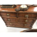 19th cent. Mahogany two over two chest of drawers with brass handles on ball supports. 41ins. x 32½