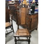 Late 17th/early 18th cent. Carolean style walnut high back hall chair with rattan seat and base.