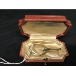 Corkscrews/Wine Collectables: 18th cent. French gold folding bow type pocket corkscrew with ribboned