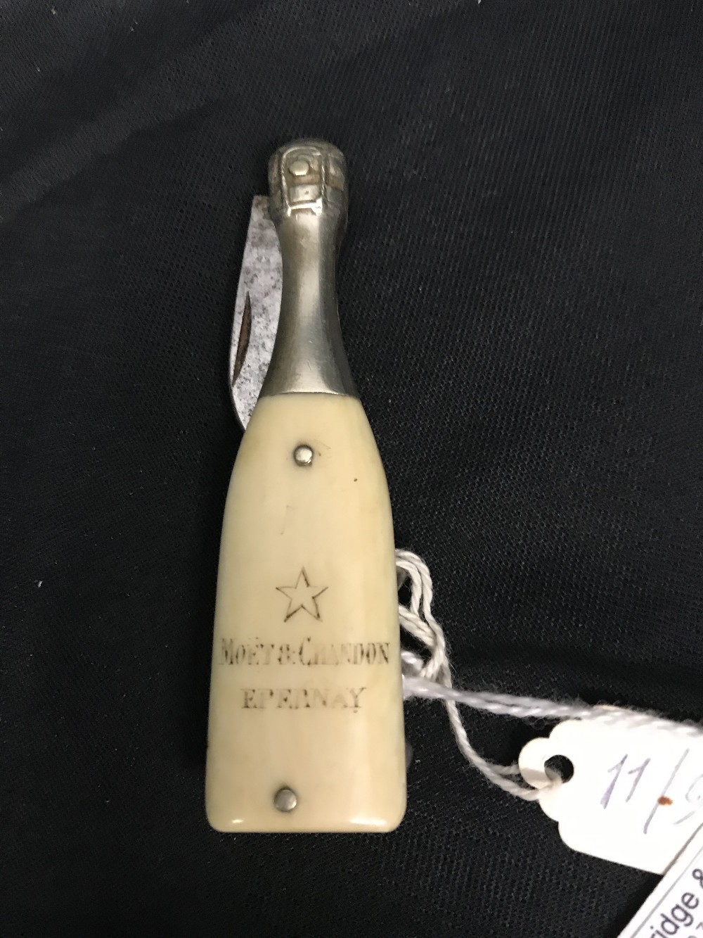 Corkscrews/Wine Collectables: Champagne bottle, bone body over steel, 2 blades, marked Moet &