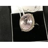 The Lady Lowry Jewellery Collection: Diamond jewellery. Rose quartz oval ring set with multiple