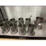 Automobilia: Eight pewter half pint tankards and a one pint tankard given as trophies in the 1960s