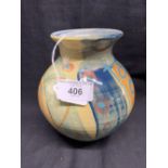 Studio Pottery: Richard Wilson baluster vase with flared rim, decorated in pastel hues. Seal mark to