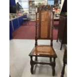 Late 17th/early 18th cent. Carolean style walnut high back hall chair with rattan seat and base.