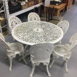 Garden Furniture: Painted aluminium garden table 43ins. Dia. Plus six matching chairs.
