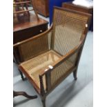 19th/20th cent. Mahogany bergère armchair.