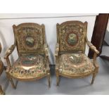 French Louis XVI style, gilt wood elbow chairs, c1875 with original tapestry covers - a pair. A/F