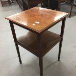 Edwardian mahogany inlaid two tier occasional table. 20ins.