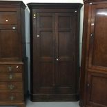 18th cent. Oak corner cupboard, fascia and shelves. 46ins. x 80ins.