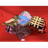 Fashion: Richard Allen a multi collection of designer scarves, floral and other geometric designs.