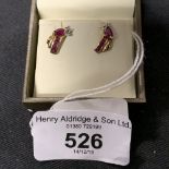 Hallmarked Gold: 9ct gold earrings each set with five rubies, estimated weight of (10) 0.03ct and
