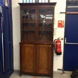 19th cent. Mahogany glazed two door bookcase/cupboard. 41ins. x 86ins.