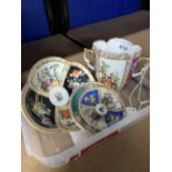 Helena Wolfson: two handled cup, saucer and miniature saucers x 3. All decorated with floral and