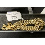 Jewellery: Yellow metal graduated curb link necklace . Length 18½ins. Width 11.6mm tapering to 5.