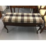 20th cent. Large mahogany music stool, with re-upholstered seat which opens to reveal a storage