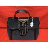 Fashion: Lulu Guinness black cord velvet bag, grosgrain lining, zip compartment with gilt logo