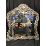 Hallmarked Silver: Framed dressing table mirror with scroll pattern.