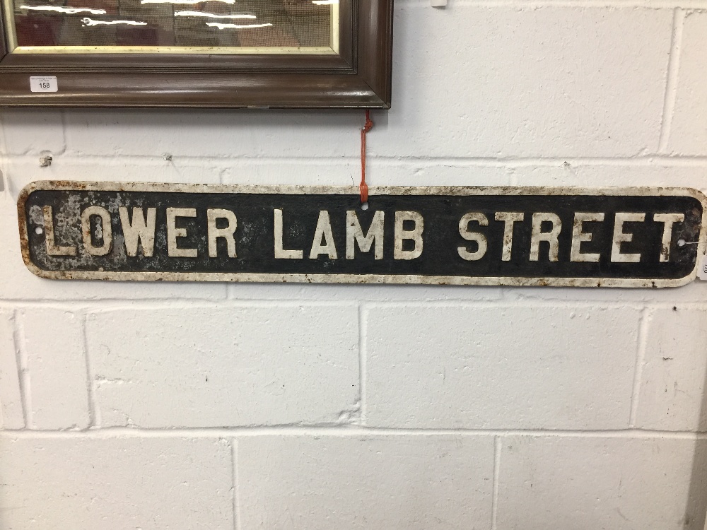 Street Furniture: Late 19th/early 20th cent. cast iron street sign for Lower Lamb Street in Bristol.