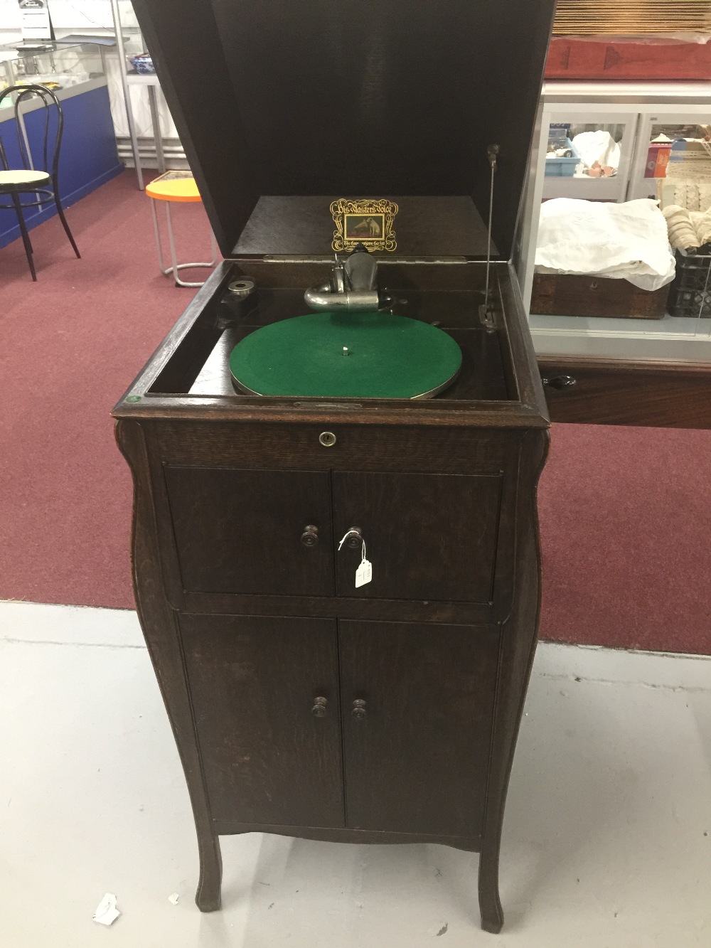 HMV Oak cabinet gramophone plus miscellaneous records.