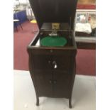 HMV Oak cabinet gramophone plus miscellaneous records.