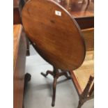 19th cent. Mahogany circular flip top table. The top produced from a single piece of wood. Single