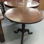19th cent. Mahogany circular tilt top side table, the top coming from a single plank of mahogany.