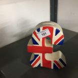 Political: Ceramic Union Jack money box on the shape of a pound. 6½ins.