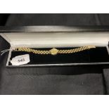 Hallmarked Gold: Ladies watch, 9ct. Woodford. Quart 2 on a triple row link bracelet. Hallmarked