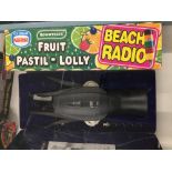Advertising: Rowntrees Beach Radio and Winemaster Vacuum Cork Extractor. Both boxed.