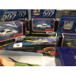 Toys: James Bond Corgi, plus two boxed cars (5), plus an Airfix model of a Mosquito.