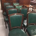 Georgian mahogany dining chairs with green leather upholstery plus a pair of later bespoke carvers