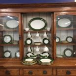 20th cent. Gilt banded Wedgwood dinner service.