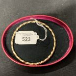 Hallmarked Jewellery: 9ct. Gold bangle, barley twist design, hallmarked Sheffield. Weight 24.8g.