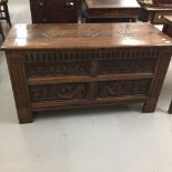 19th cent. Carolean style oak coffer with carved panels and later restoration. 47ins.